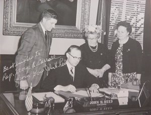 Reed-signing-bill-(2).jpg Reed-signing-bill-(2).jpg