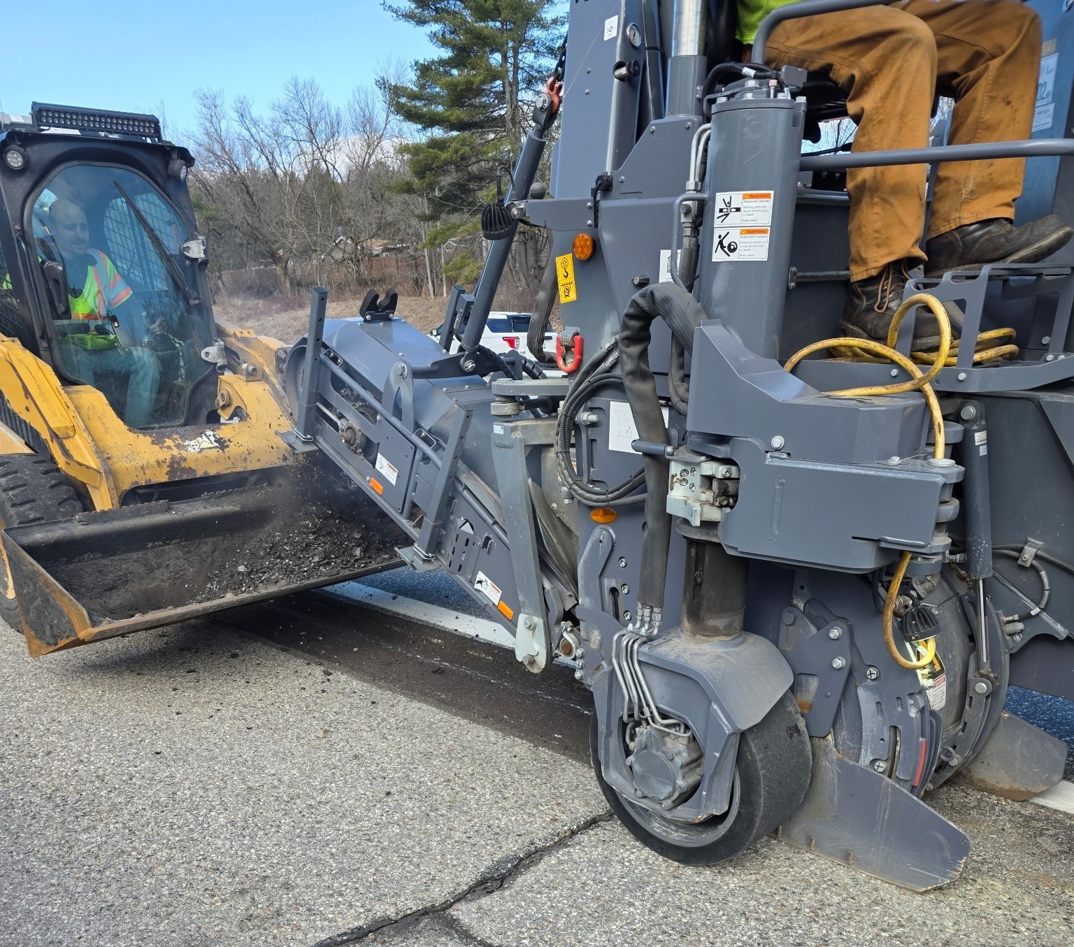 Equipment-removes-rumble-strips-in-April-2025.jpg Equipment-removes-rumble-strips-in-April-2025.jpg